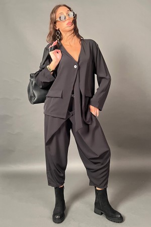 Koordinierte Elvira-Hose und Bluse mit schwarzer Cinta und detailliertem Oro koordinierte Elvira-Hose und Bluse mit schwarzer Ci