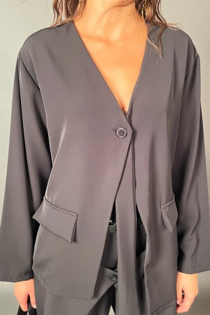 Koordinierte Elvira-Hose und Bluse mit schwarzer Cinta und detailliertem Oro koordinierte Elvira-Hose und Bluse mit schwarzer Ci