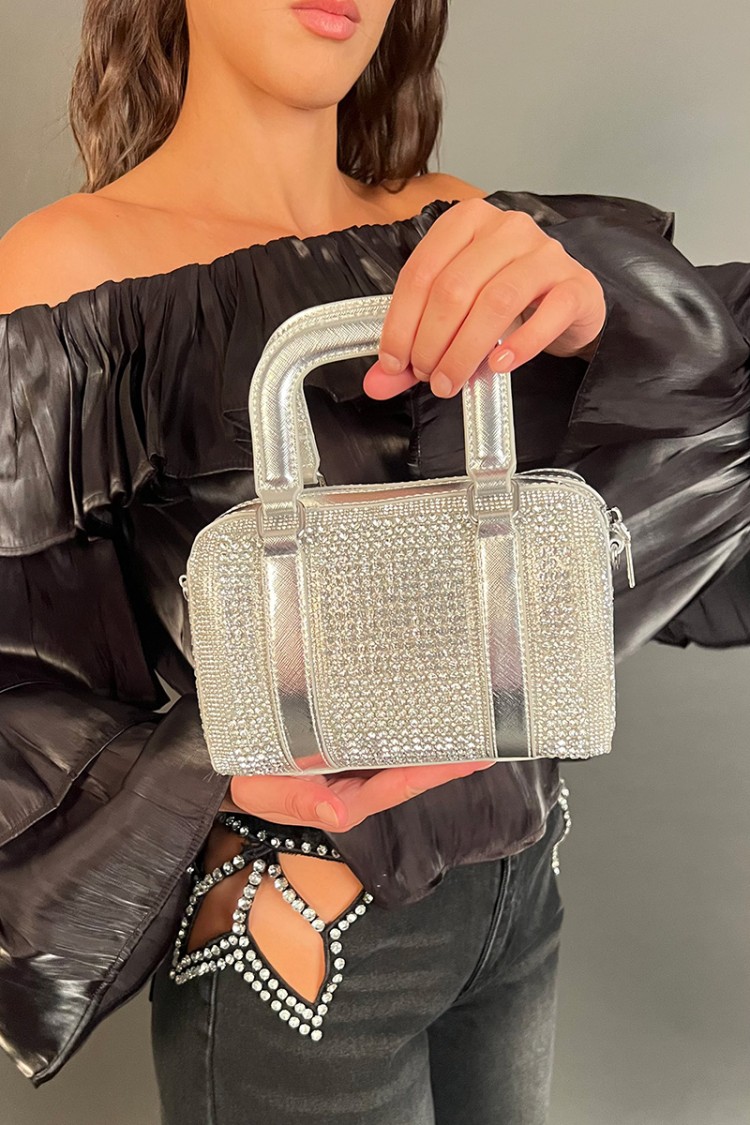 Glitter bag with rhinestones and two handles Glitter bag with rhinestones and two handles Glitter bag at the top... 