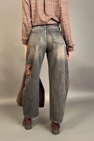 Pantalone jeans Cleo con inserti traforati in pizzo crochet  Pantalone jeans Cleo con inserti traforati in pizzo crochet  Pan...