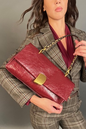 Borsa Melana in ecopelle con manica dettaglio fantasia  Borsa Melana in ecopelle con manica dettaglio fantasia  Borsa Melana ...