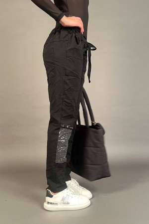 Diamanthose in gekräuseltem Gewebe mit Pailletten-Patches Diamanthose in gekräuseltem Stoff mit Flecken in Eimer... 