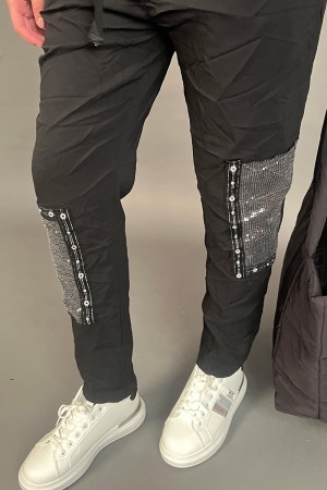 Pantalone Diamante in tessuto arricciato con toppe in paillettes  Pantalone Diamante in tessuto arricciato con toppe in paill...