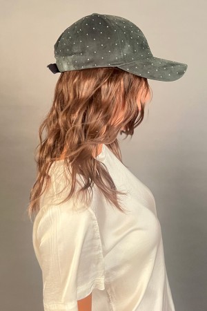 Bright hat in ecocamoscusci with small studs with shiny hat visor in eco-samoscusci with small studs... 
