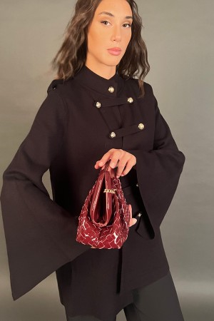 Borsa Gianna intrecciata clutch in ecopelle lucida  Borsa Gianna intrecciata clutch in ecopelle lucida  Borsa Gianna intrecci...