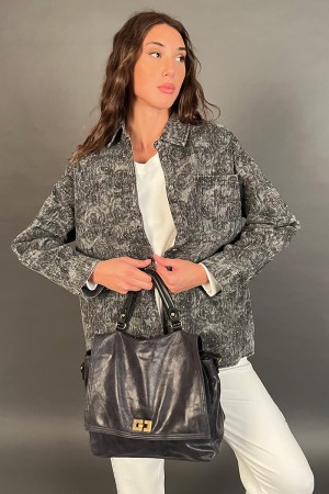 Giacca Betta in jeans con svaroski e fantasia floreale astratta Giacca Betta in jeans con svaroski e fantasia floreale astrat...