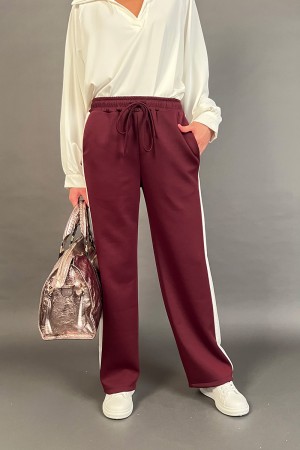 Koordinierte Elle in Anzug mit Jacke und Hose mit kontrastierender Seitenstreifen