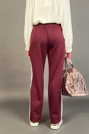 Koordinierte Elle in Anzug mit Jacke und Hose mit kontrastierender Seitenstreifen