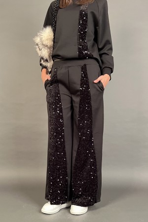 Coordinato in tuta Ginevra con fasce di paillettes piatte tono su tono Coordinato in tuta Ginevra con fasce di paillettes pia...