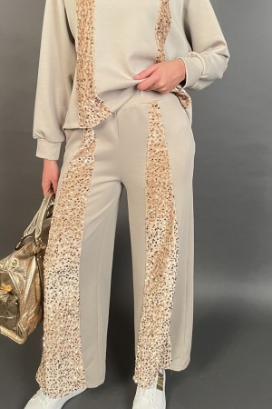Coordinato in tuta Ginevra con fasce di paillettes piatte tono su tono Coordinato in tuta Ginevra con fasce di paillettes pia...