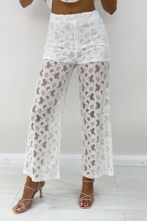 Top sin mangas de Eleoire coordinada y pantalones con bordado floral