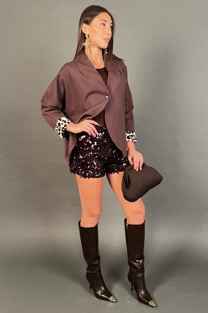 Giacca Silvy asimmetrica con risvolto maniche animalier  Giacca Silvy asimmetrica con risvolto maniche animalier  Giacca Silv...
