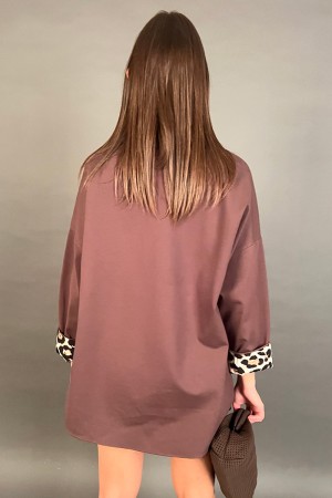 Giacca Silvy asimmetrica con risvolto maniche animalier  Giacca Silvy asimmetrica con risvolto maniche animalier  Giacca Silv...