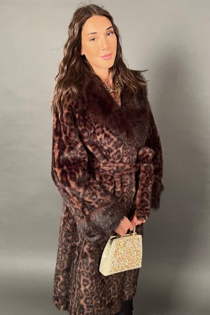 Long cow air in eco-plaster with maculated animal print finishes with coordinated fur edges