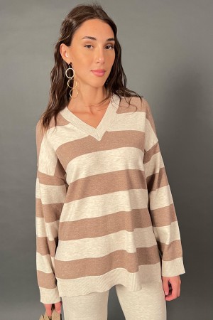 Coordinato Minny in maglia con blusa a righe orizzontali e pantalone tinta unita Coordinato Minny in maglia con blusa a righe...