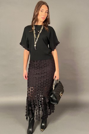 Coordinato Love maglia e gonna con tessuto a forma di cerchio con frangia dello stesso tessuto  Coordinato Love maglia e gonn...