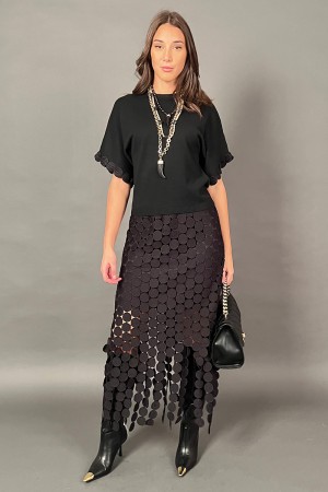 Coordinato Love maglia e gonna con tessuto a forma di cerchio con frangia dello stesso tessuto  Coordinato Love maglia e gonn...