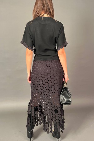 Coordinato Love maglia e gonna con tessuto a forma di cerchio con frangia dello stesso tessuto  Coordinato Love maglia e gonn...
