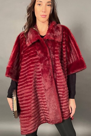 Ecopelliccia Atena modello poncho con colletto classico a punta Ecopelliccia Atena modello poncho con colletto classico a pun...