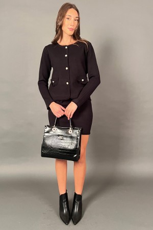 Coordinato Chic in maglia gonna e maglia con bottoni argento rigati Coordinato Chic in maglia gonna e maglia con bottoni arge...