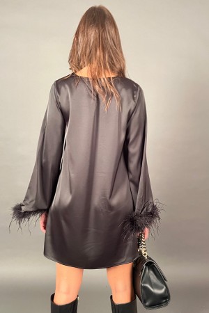 Short pattern feather dress with long sleeve and feather effect on cuff background