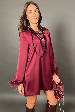 Short pattern feather dress with long sleeve and feather effect on cuff background