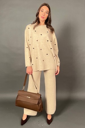 Coordinated knitted francy with fantasy knit hearts and trousers