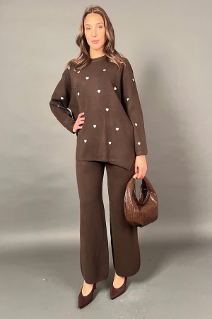 Coordinato Francy in maglia con fantasia cuori maglia e pantalone Coordinato Francy in maglia con fantasia cuori maglia e pan...