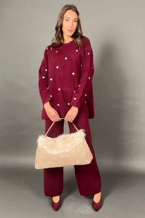 Coordinato Francy in maglia con fantasia cuori maglia e pantalone Coordinato Francy in maglia con fantasia cuori maglia e pan...