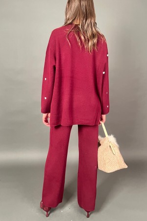 Coordinato Francy in maglia con fantasia cuori maglia e pantalone Coordinato Francy in maglia con fantasia cuori maglia e pan...